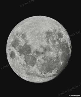 Detailed Full Moon – Detailed full moon with craters on a black sky.