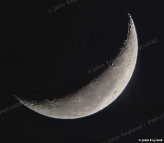 Thin Crescent Moon – Thin crescent moon, Shasta County, CA. June 2020. John England.