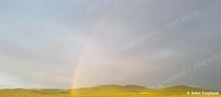 Rainbow over Spring Hills – Rainbow over green spring hills, Northern California. Mar 2019. John England.