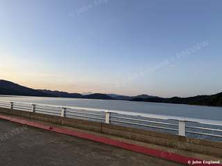 Shasta Dam Walkway at Dusk – Shasta Lake from the Shasta Dam walkway at dusk, Shasta County, CA.