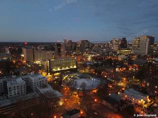 Blue Hour over Midtown – Aerial blue-hour with warm streetlights.