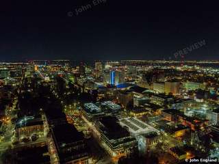 City Grid at Night – Aerial night view over the Sacramento grid toward the downtown towers.