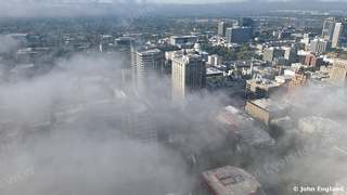 Fog over Downtown Sacramento – Aerial view of fog drifting through downtown Sacramento, CA. Mar 2022. John England.