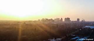 Golden Haze Over Sacramento – Drone panorama of the Sacramento skyline in golden morning haze.