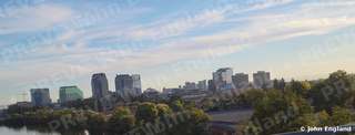 River Skyline Afternoon – Sacramento skyline over the river from a bridge rail.