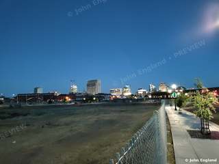 Sacramento Skyline from West Sacramento – Downtown Sacramento skyline at blue hour from the West Sacramento riverfront, CA. Apr 2021. John England.
