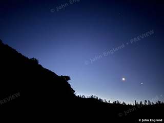 Pre-Dawn Planet Over Ridge – A planet before dawn over the ridge, Shasta Lake area, CA. Jun 22, 2025. John England.