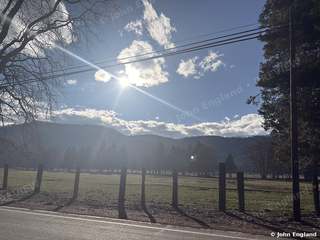Winter Sun Over the Pasture, Northern California – Winter sunburst over a fenced pasture and forested hills in Northern California. Mar 2, 2026. John England.